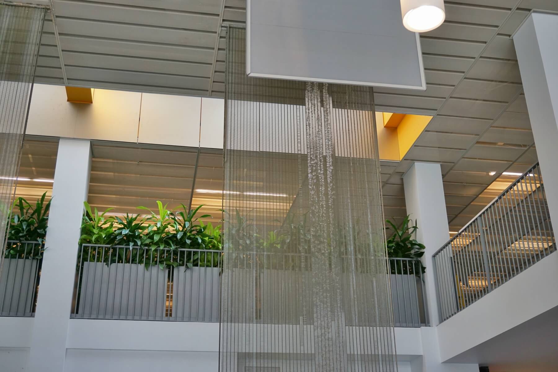 The radiant cooling "waterwalls" inside the Lavin-Bernick Center